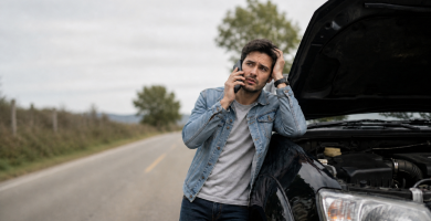 Driver calling for help after a car breakdown