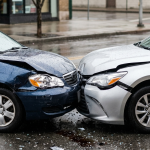 Two cars damaged in a front-end collision for a collision insurance guide