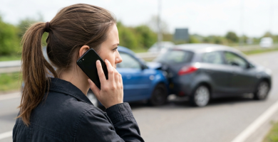 Driver calling after a car accident for a liability insurance guide