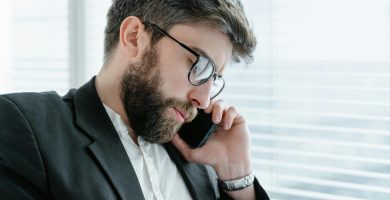 Driver calling insurance company about canceling car insurance
