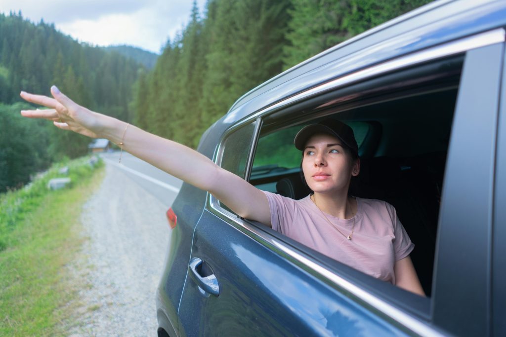 Driver confused about car insurance myths on a road trip