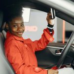 Teen driver sitting in a car