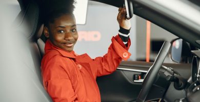 Teen driver sitting in a car