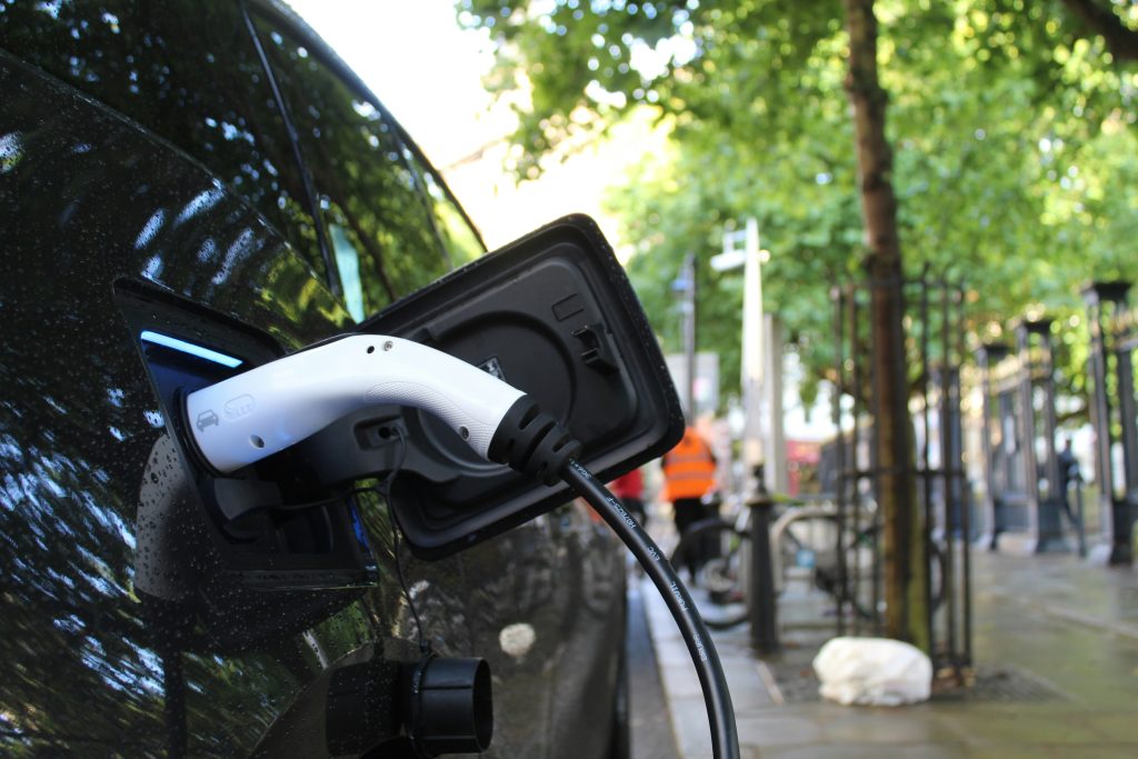 Electric vehicle charging at a public charging station
