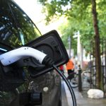 Electric vehicle charging at a public charging station