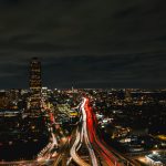 Houston skyline at night with highway traffic