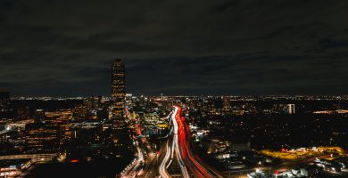 Houston skyline at night with highway traffic