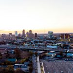 San Antonio skyline with highway traffic at sunset