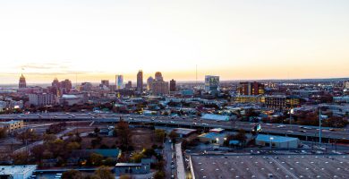San Antonio skyline with highway traffic at sunset