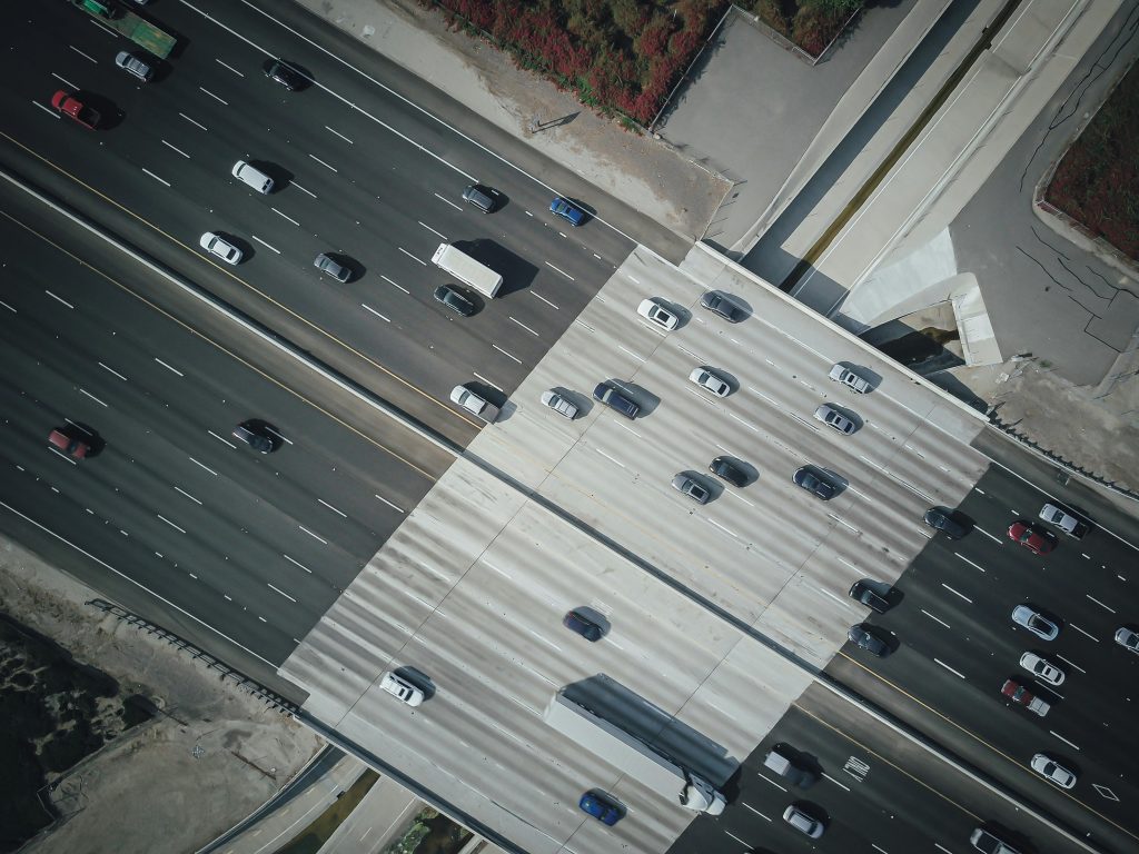 Aerial view of highway traffic with cars
