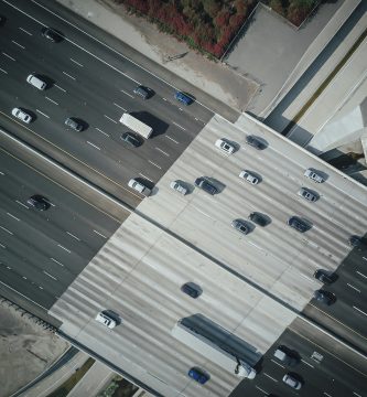 Aerial view of highway traffic with cars