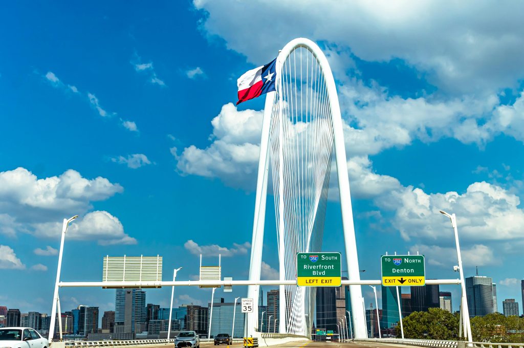 Margaret Hunt Hill Bridge in Dallas with Texas flag