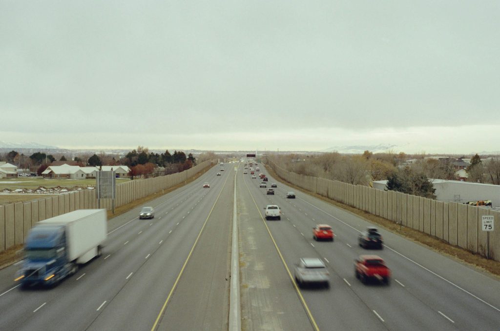 Cars driving on a highway for a Georgia car insurance guide